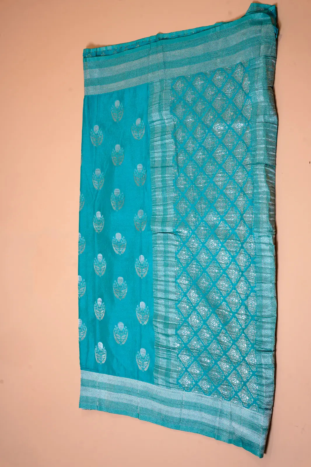 Teal Blue Tissue Silk Saree with Silver Zari Work