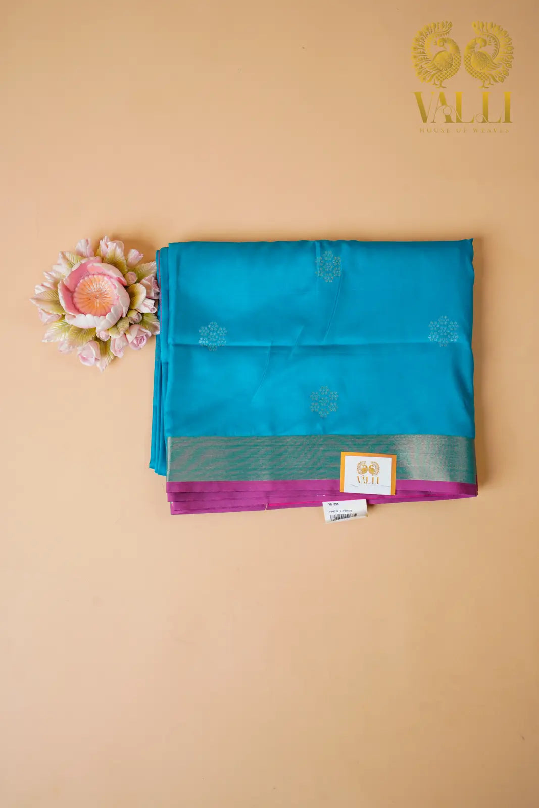 Teal Blue Soft Silk Saree with Floral Motifs & Rich Pink Pallu