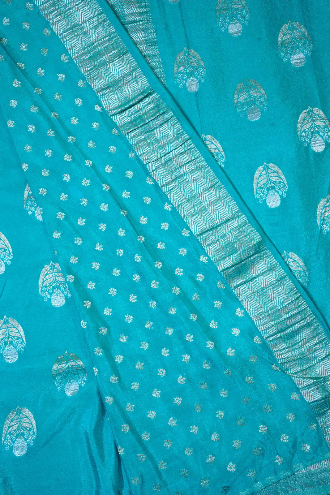 Teal Blue Tissue Silk Saree with Silver Zari Work