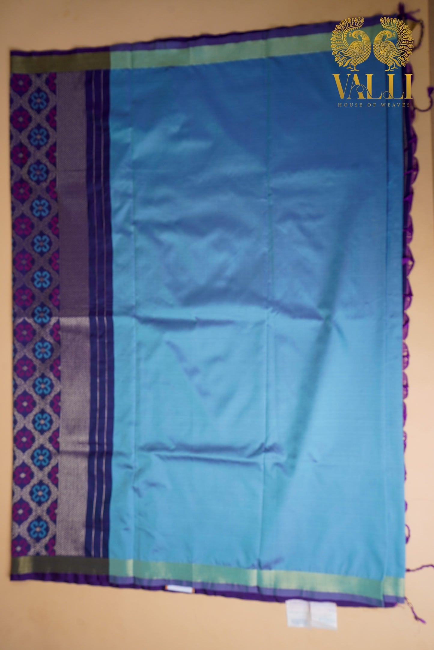 Teal blue Saree with Heavy Ikat dark blue Pallu & Zari Border