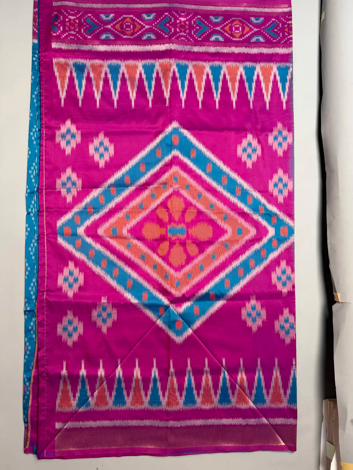Teal Blue Pochampally Ikat Saree with Pink Contrast Border