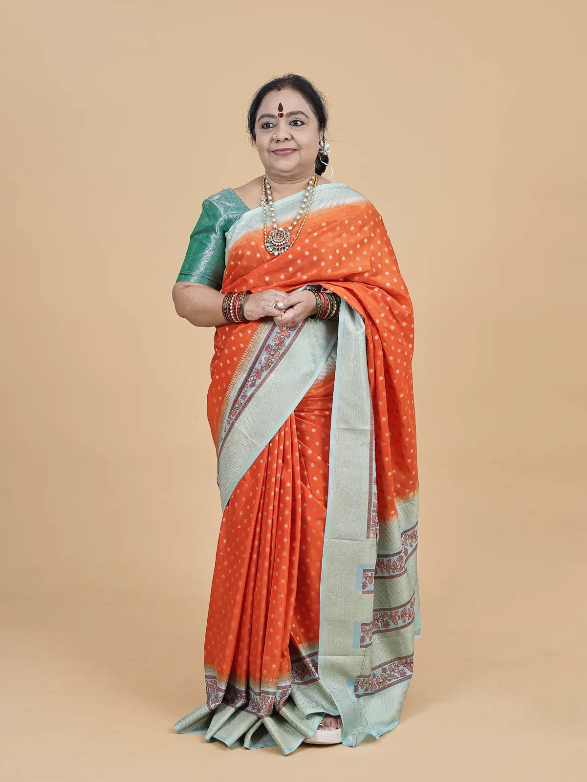 Soft Silk Saree – Orange with Gold Butta & Sea Green Kalamkari Border
