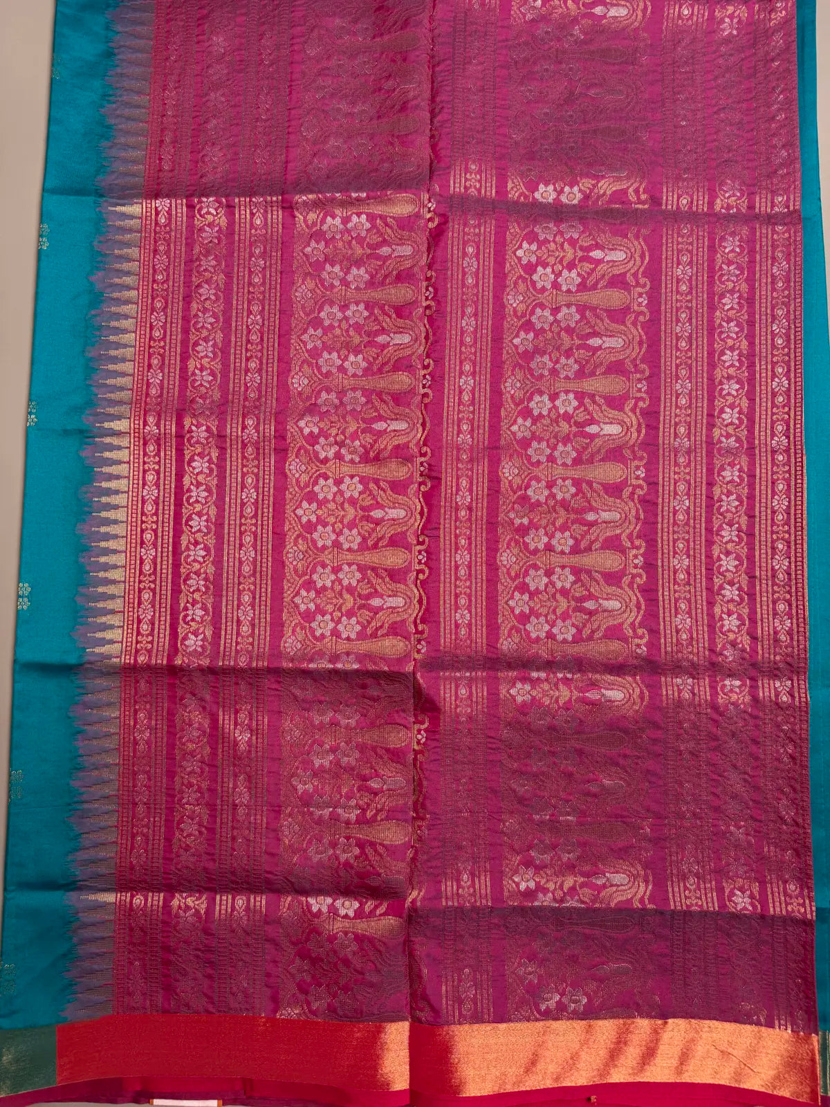Teal Blue Soft Silk Saree with Floral Motifs & Rich Pink Pallu