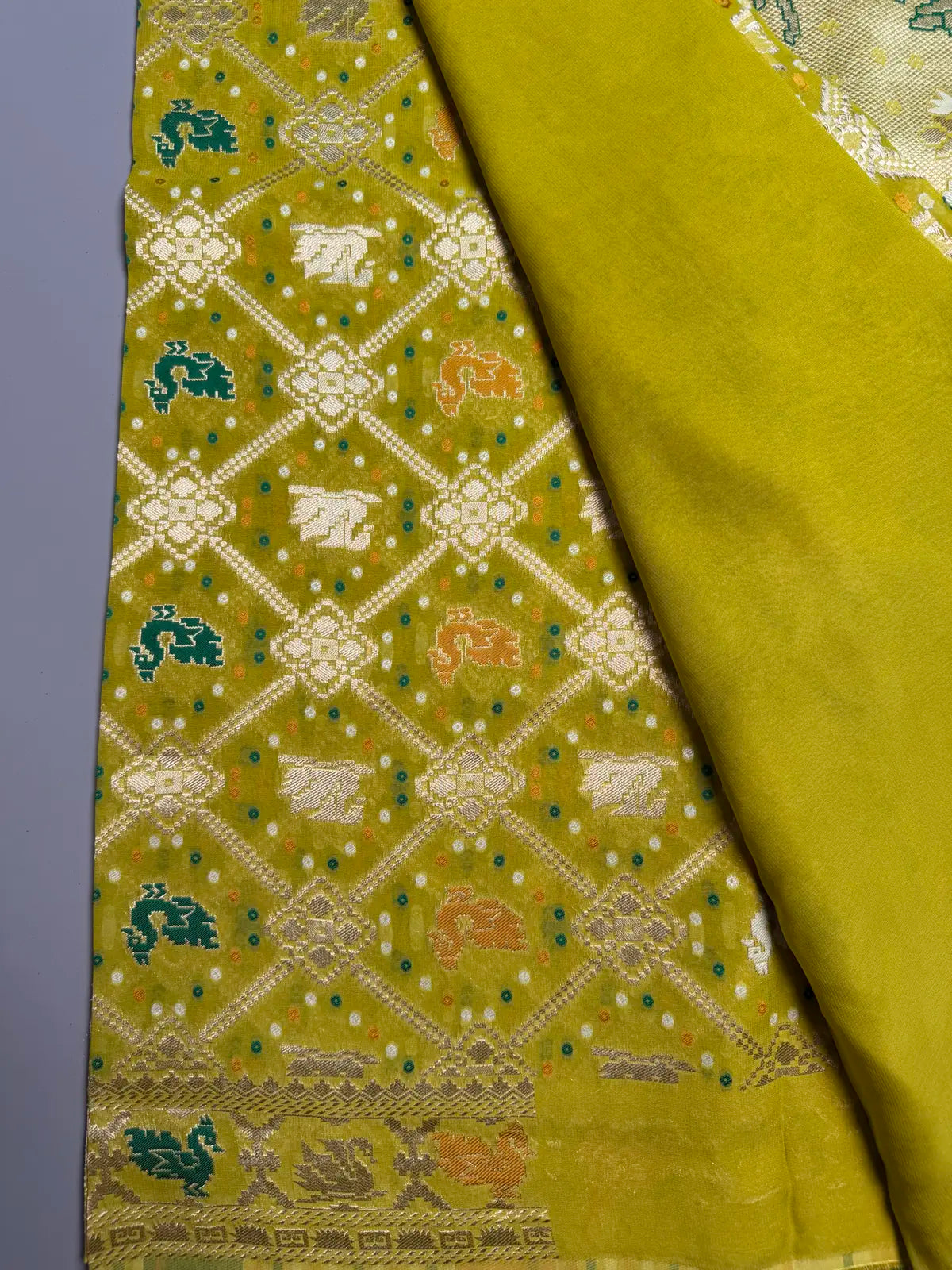 Parrot Green georgette Banarasi Silk Saree with Bird Jaal Weave