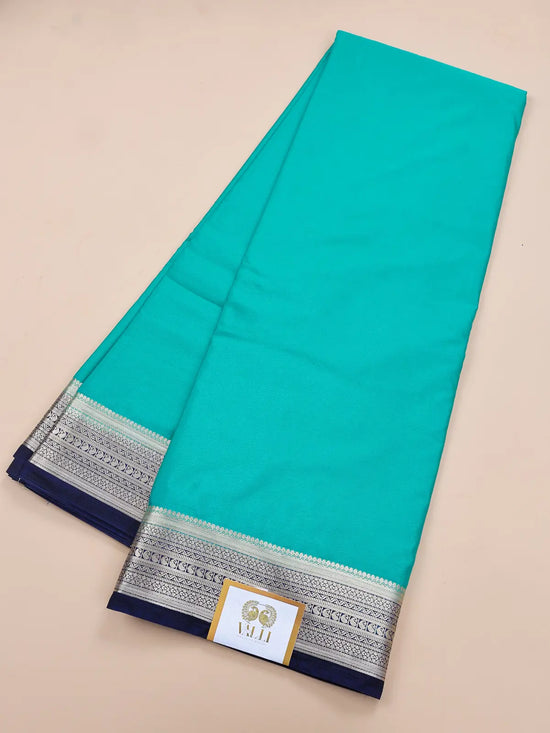 Contrast Border Semi Crepe Silk Saree with Silver Zari Border & Pallu - Green +Blue
