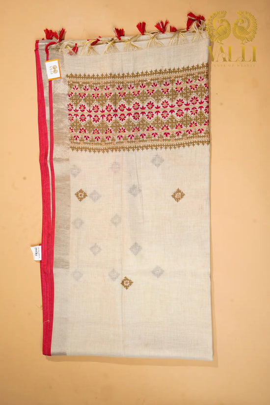 Tissue Linen Saree – Hand Knot Threadwork Pallu with Red Selvedge Border