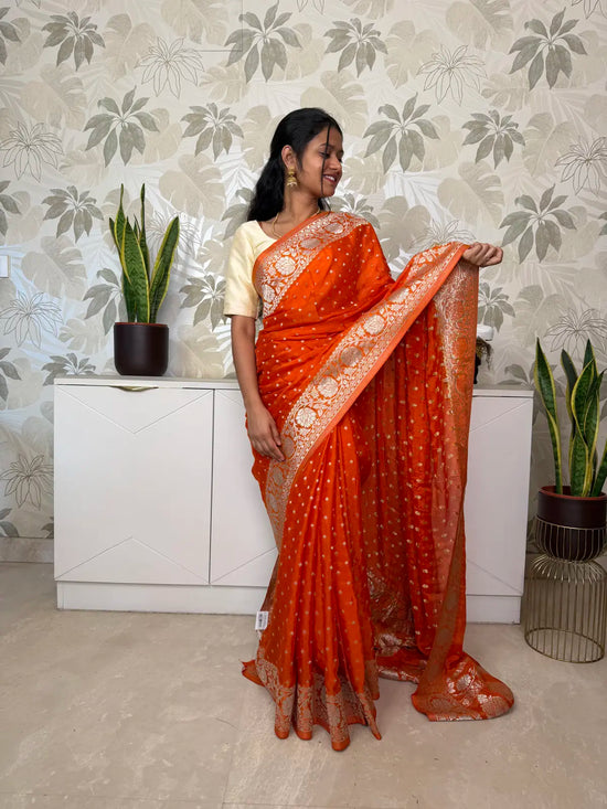 Banarasi Georgette Saree – Vibrant Orange with Silver Zari Motifs