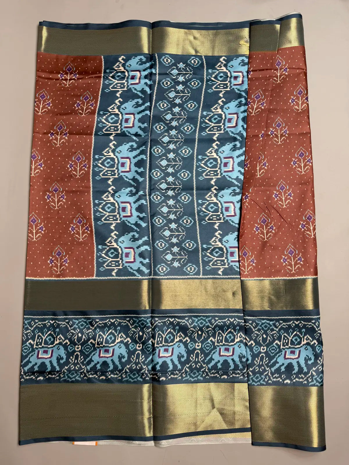 Plum Ikat Semi Silk Saree with Grey Elephant Border