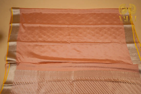 Pastel Peach Banarasi Crepe Silk Saree with Yellow Selvage‘