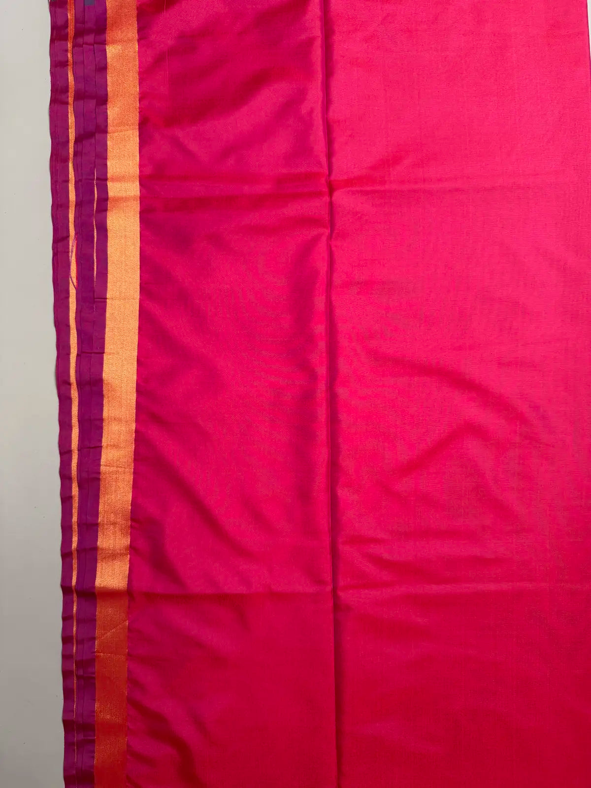 Rani Pink Saree with Heavy Ikat Green Pallu & Zari Border