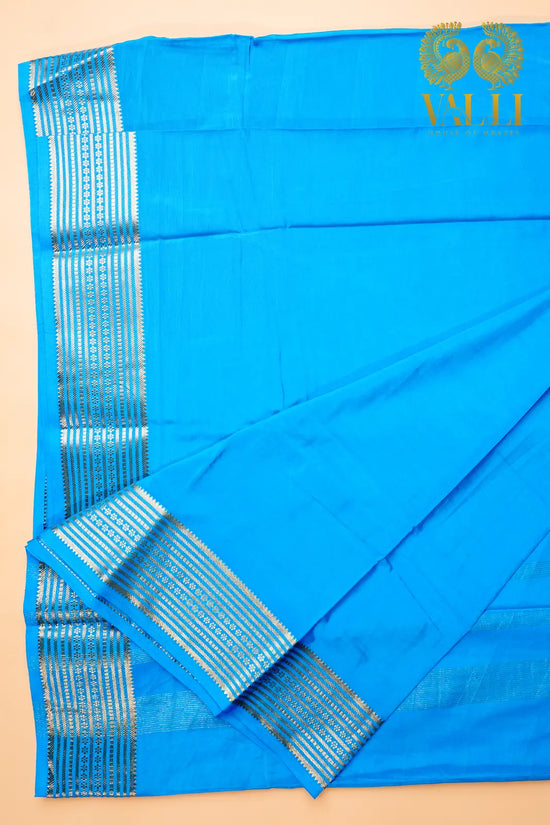 Sky Blue Semi Crepe Silk Saree with potli Zari Border