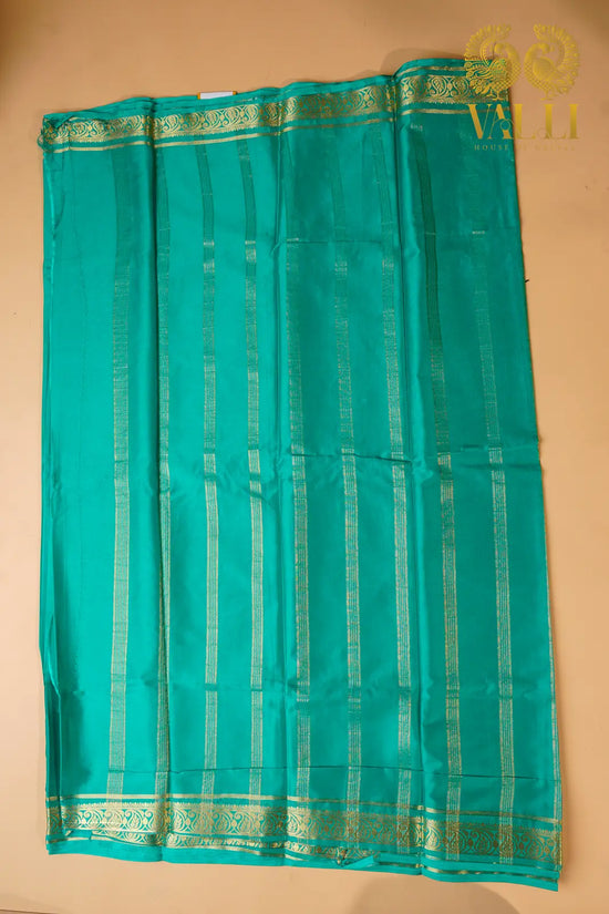 Emerald Green Crepe Silk Saree with Mango Zari Border