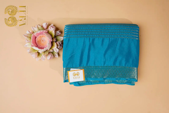 Aqua Blue Semi Crepe Silk Saree with Silver Zari Weaves