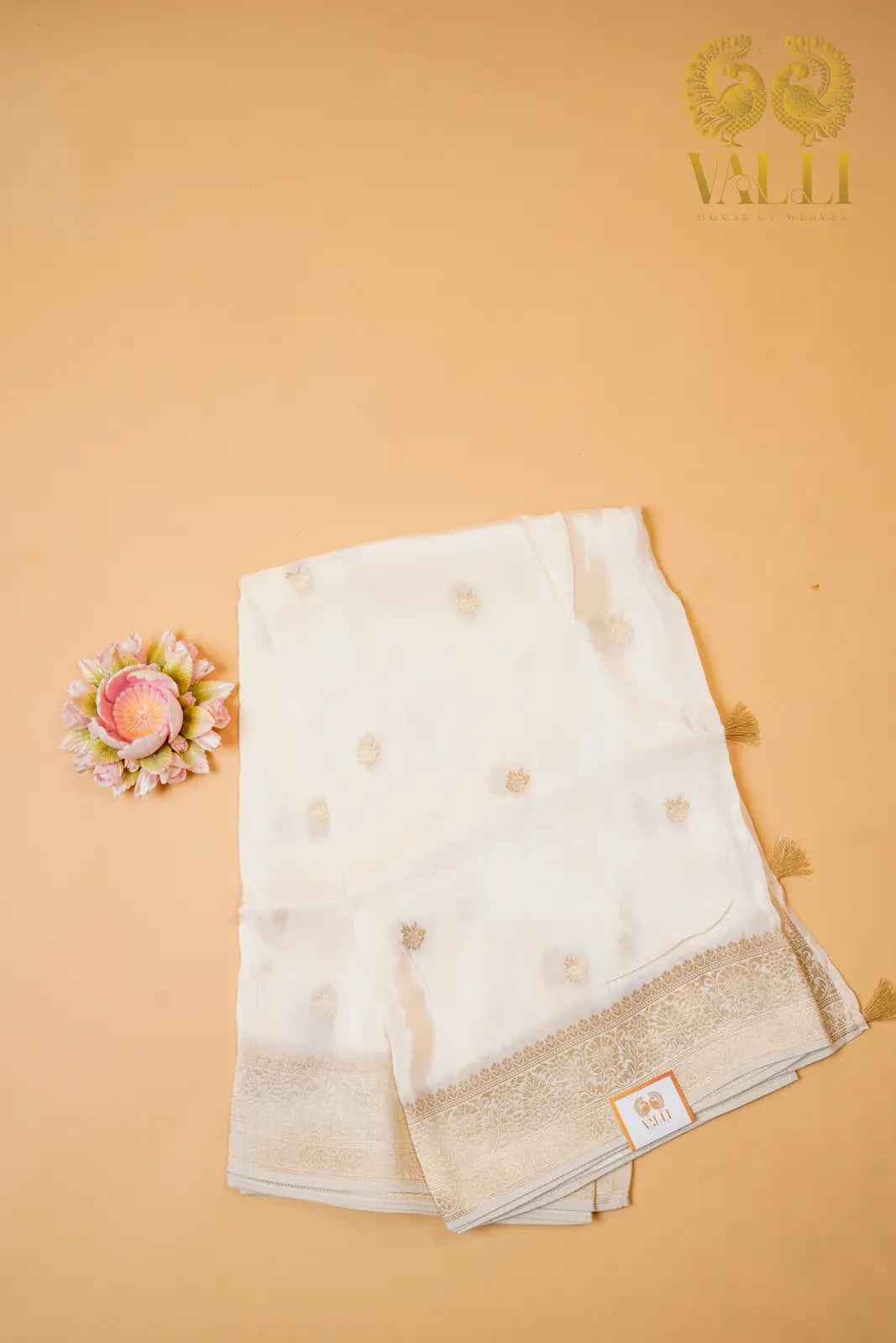 White satin crepe with gold Zari border