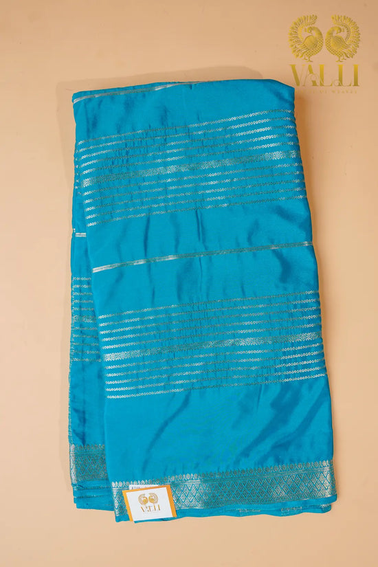 Aqua Blue Semi Crepe Silk Saree with Silver Zari Weaves