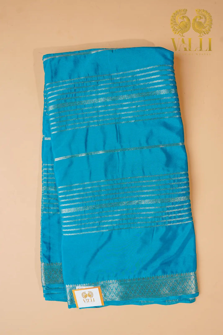 Aqua Blue Semi Crepe Silk Saree with Silver Zari Weaves