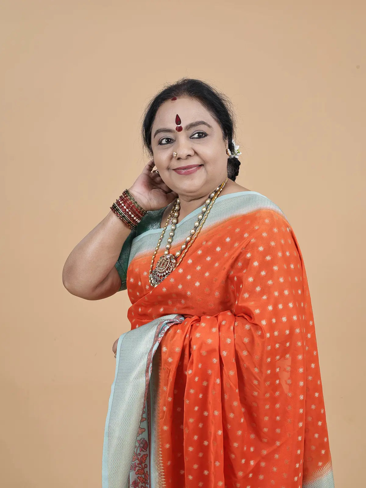 Soft Silk Saree – Orange with Gold Butta & Sea Green Kalamkari Border
