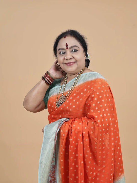 Soft Silk Saree – Orange with Gold Butta & Sea Green Kalamkari Border