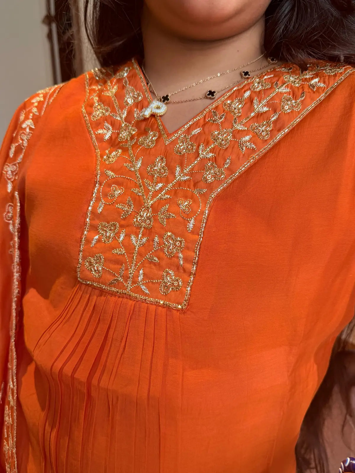 Orange A  line salwar set v neck pattern