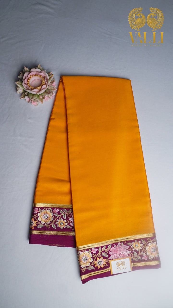 Orange + purple pure crepe silk saree with embroidery