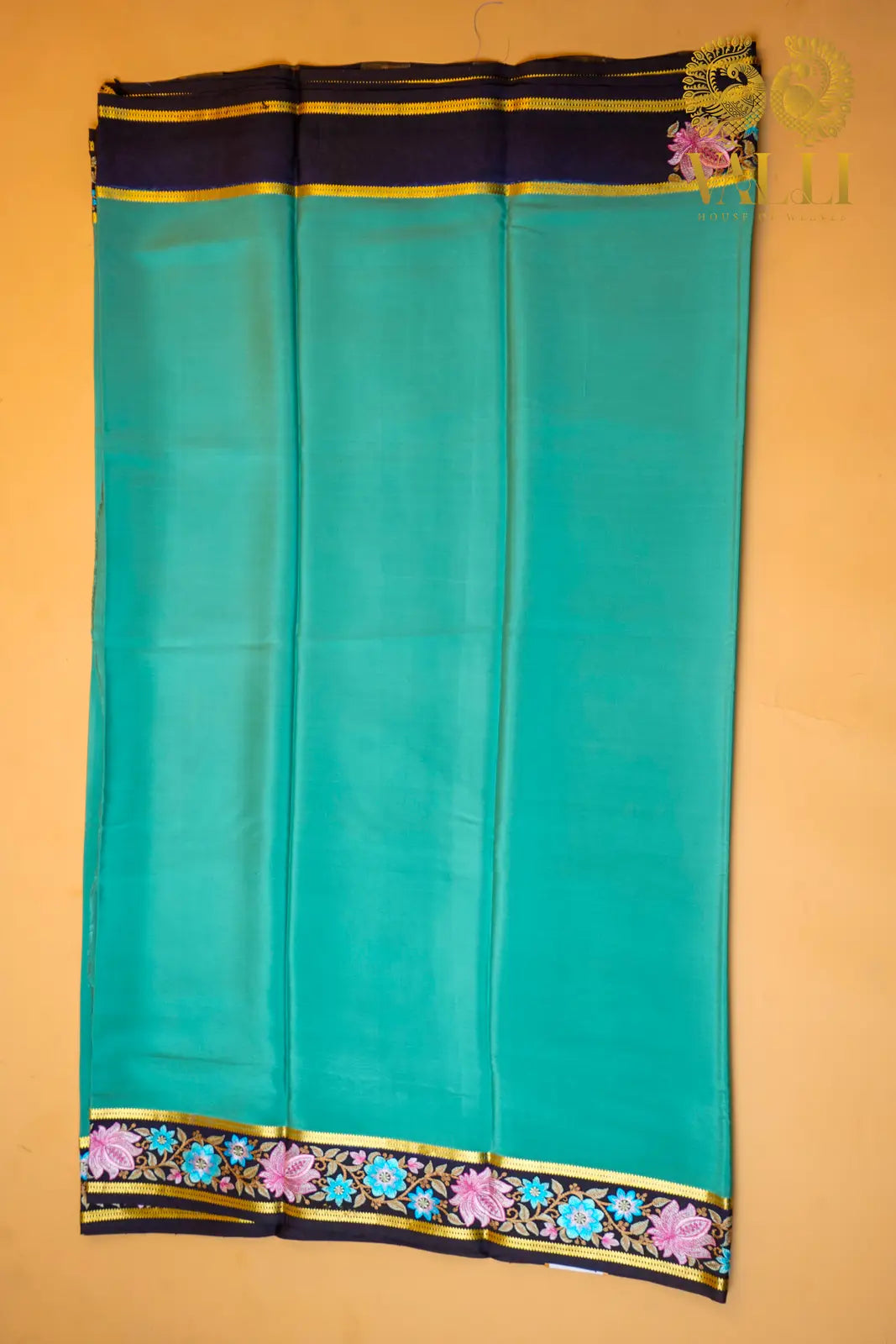 Sea Green Pure Crepe Silk Saree with Contrast Embroidered Border