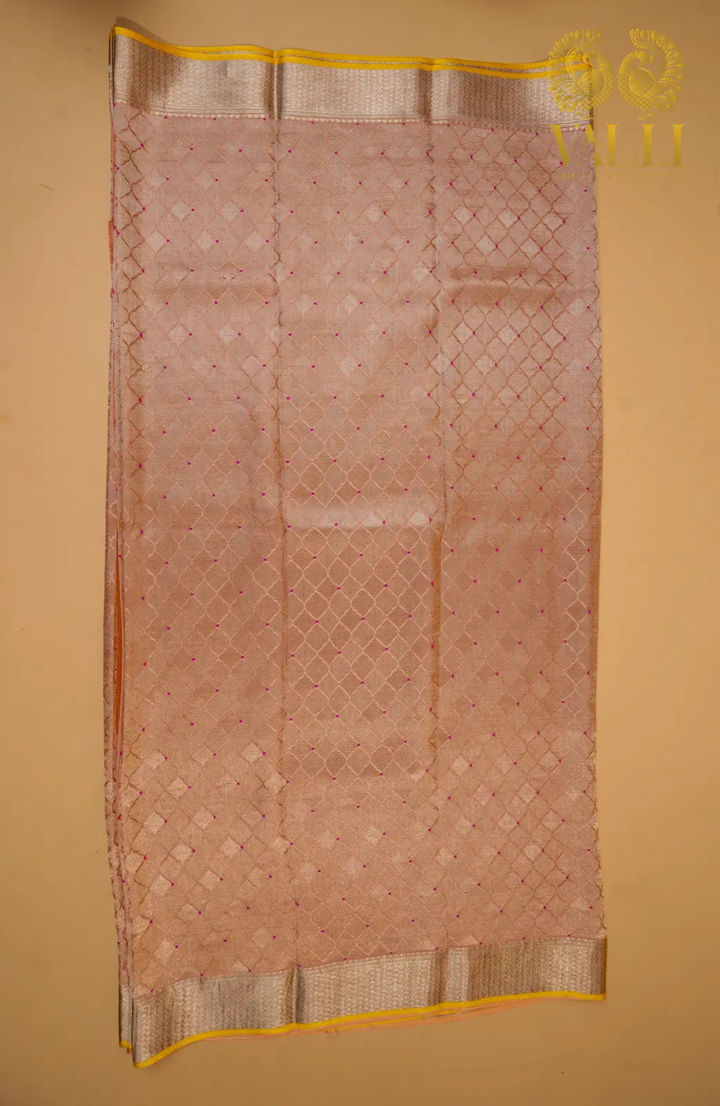 Pastel Peach Banarasi Crepe Silk Saree with Yellow Selvage‘