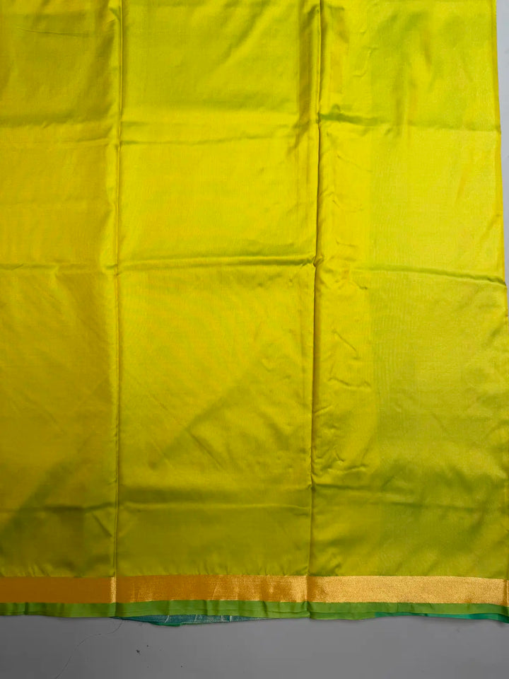 Parrot Green Saree with Heavy Ikat Turquoise Pallu & Brocade Ikat Blouse