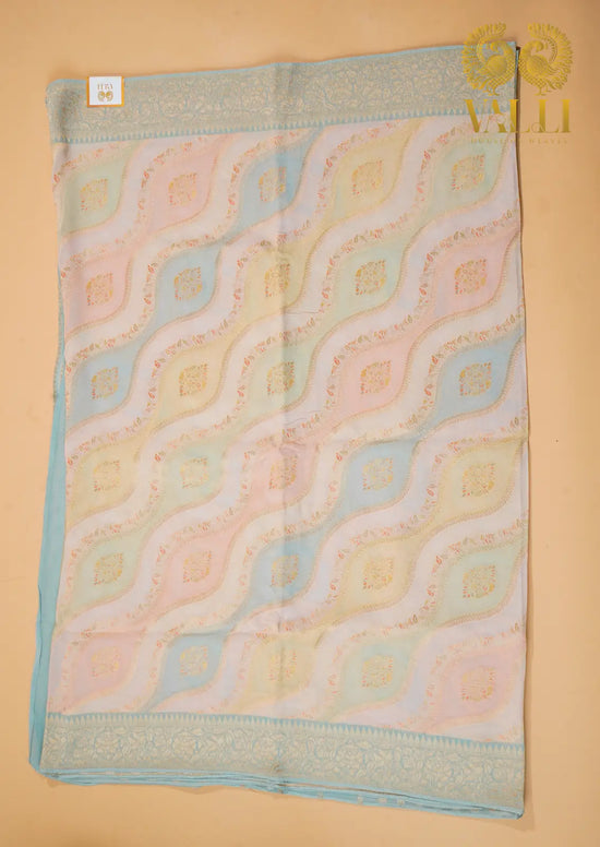 Pastel Wave Pattern Georgette Saree with Zari Butta Blouse