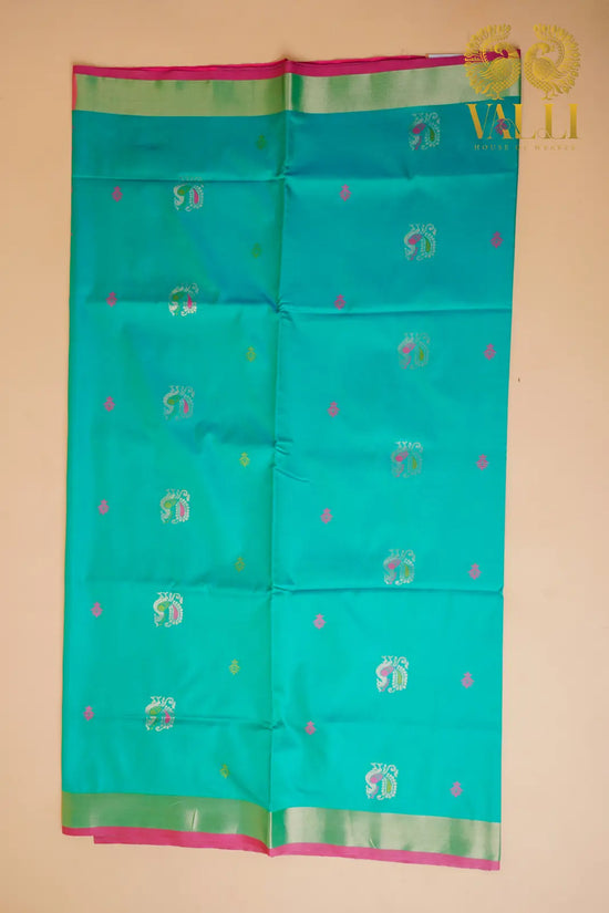Flower Soft Silk Saree – Green Floral Weave with Geometric Brocade Pallu
