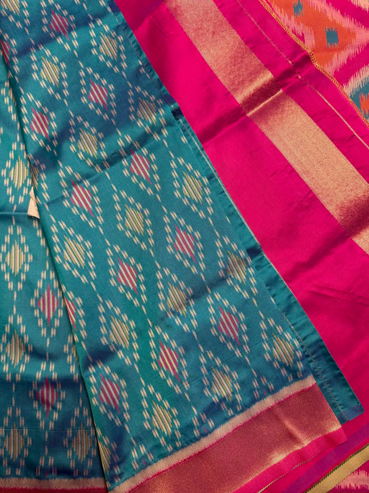Green Pochampally Ikat Saree with Pink Contrast Border  