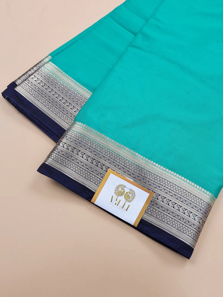 Contrast Border Semi Crepe Silk Saree with Silver Zari Border & Pallu - Green +Blue
