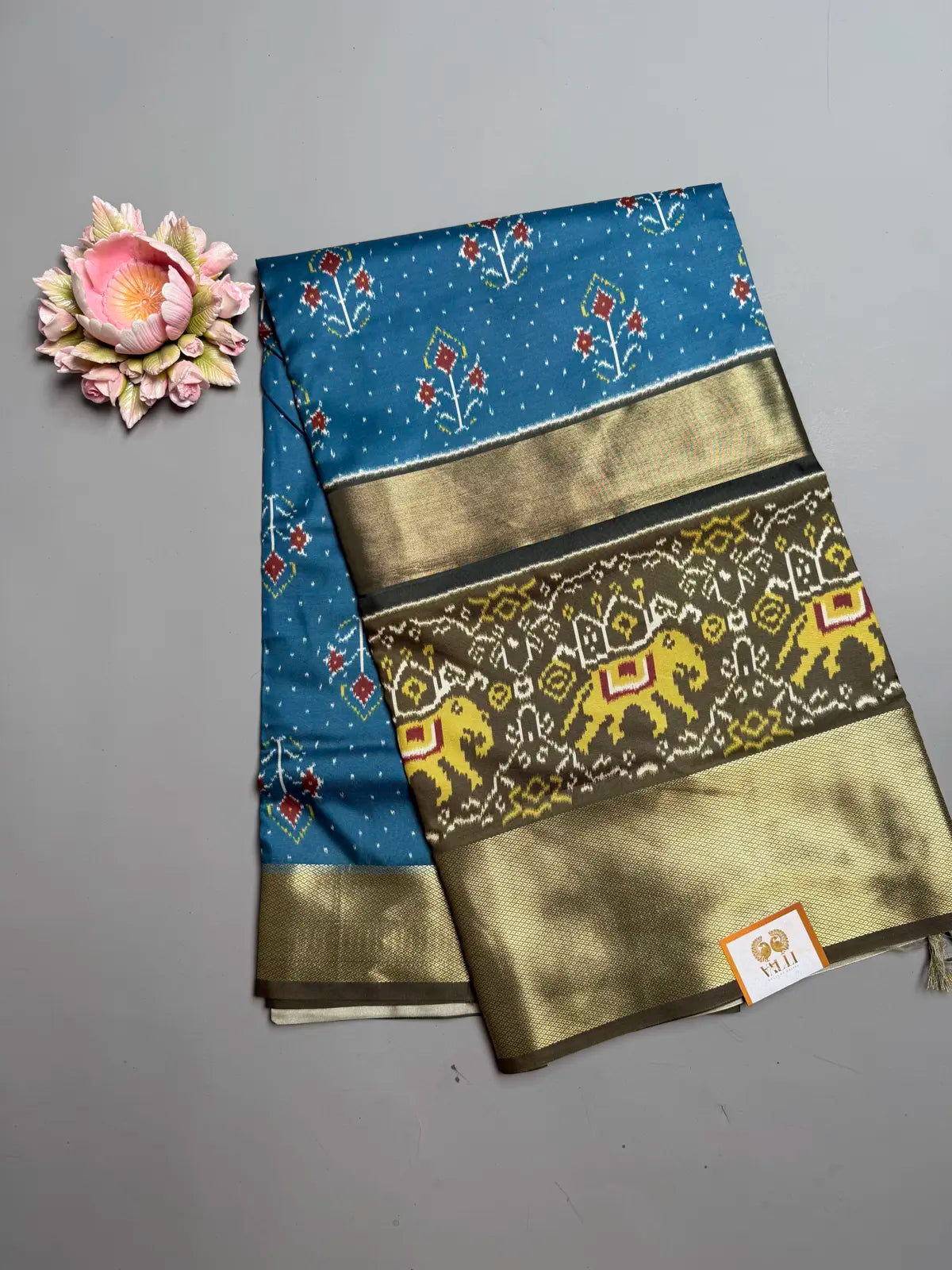 Blue Ikat Semi Silk Saree with Olive Elephant Motif Border