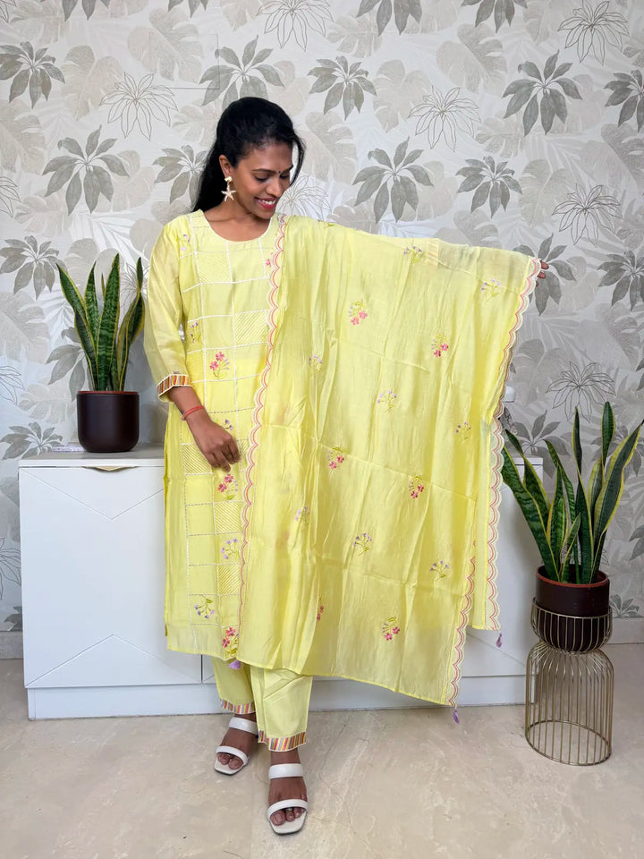 Yellow Cotton Salwar Set with Floral Embroidery and Scalloped Dupatta