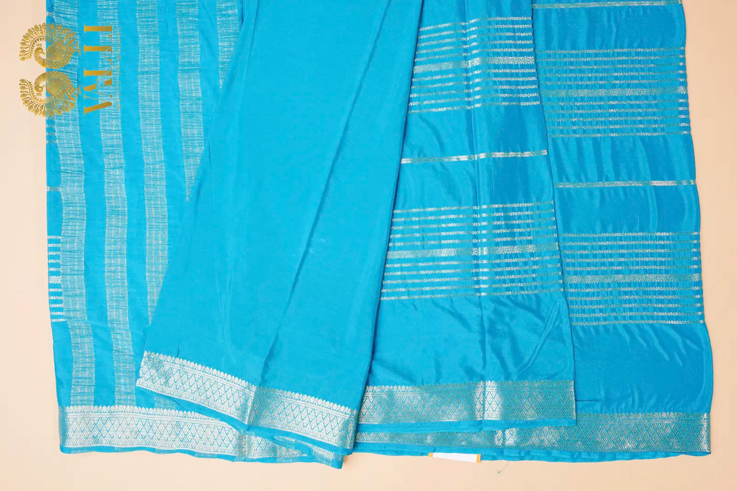 Aqua Blue Semi Crepe Silk Saree with Silver Zari Weaves