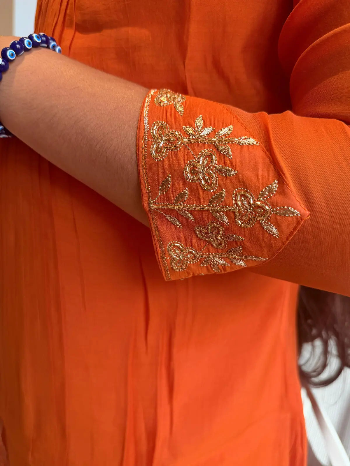 Orange A  line salwar set v neck pattern