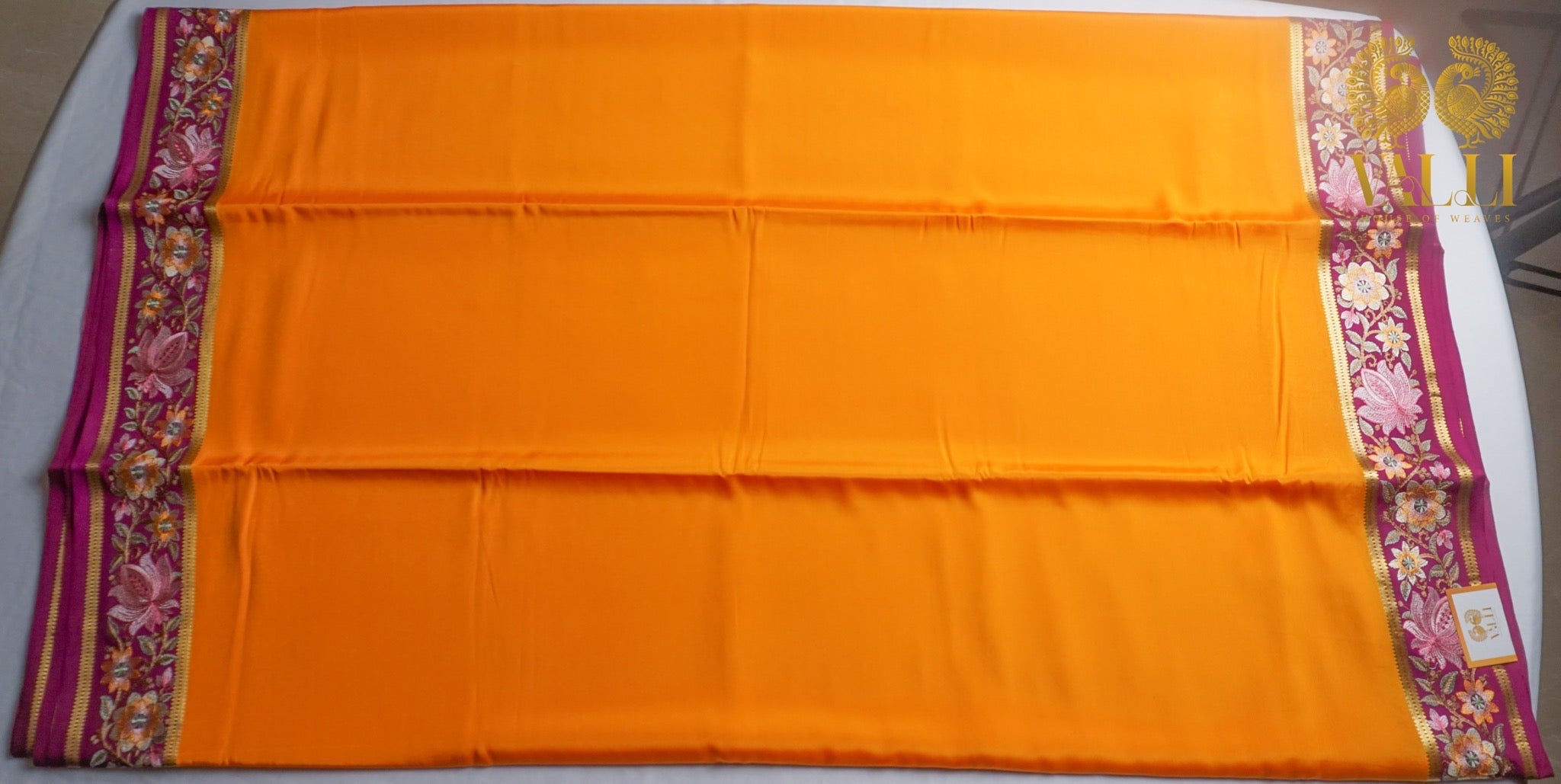 Orange + purple pure crepe silk saree with embroidery