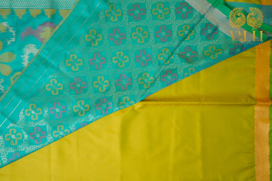 Ikkat Pallu Semi Silk Saree – Yellow Body with Heavy Ikkat Pallu & Pink Brocade Blouse