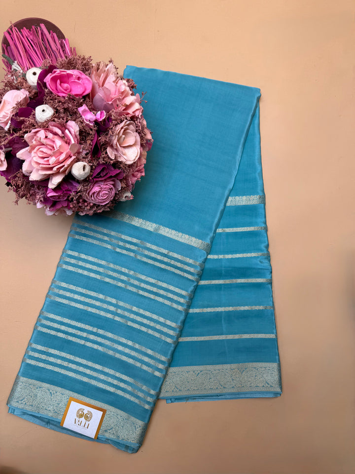 Blue Semi Crepe Saree with Satin Finish & Gold Zari Border