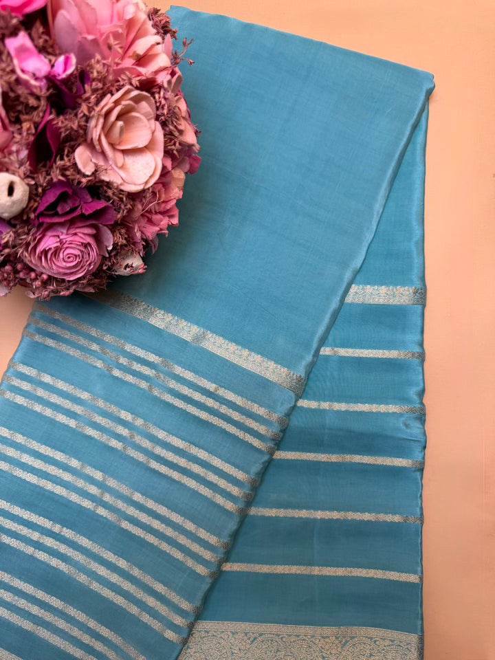 Blue Semi Crepe Saree with Satin Finish & Gold Zari Border