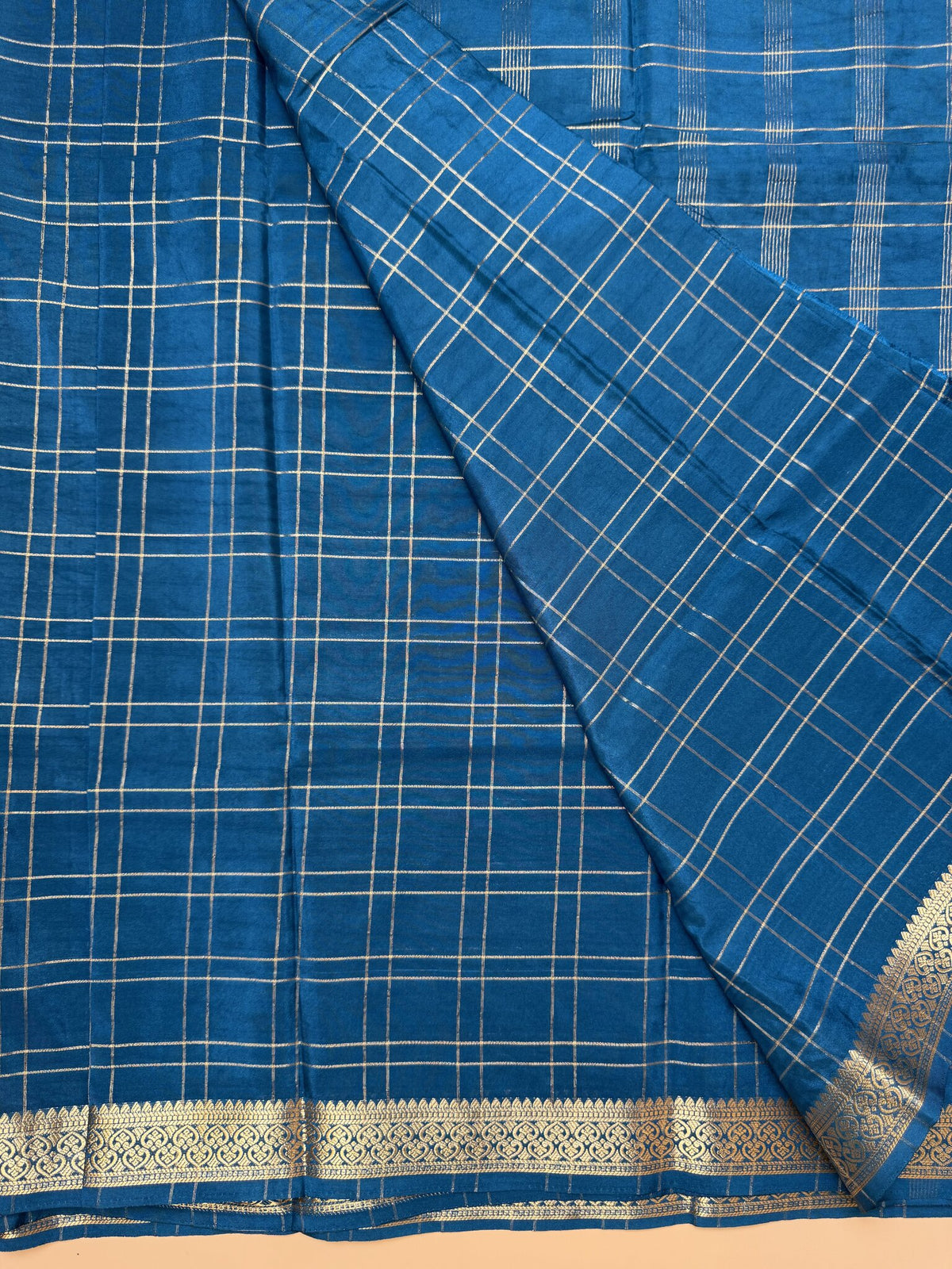 Teal Blue Check Semi Crepe Silk Saree