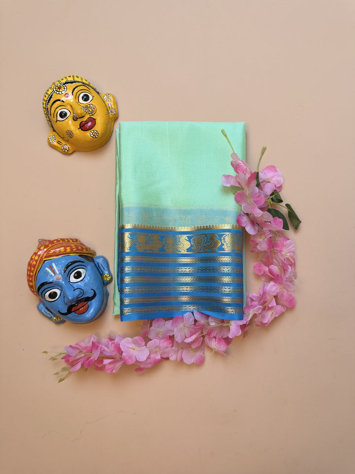 Sea Green & Rama Blue Mysore Crepe Silk Saree with Peacock Border