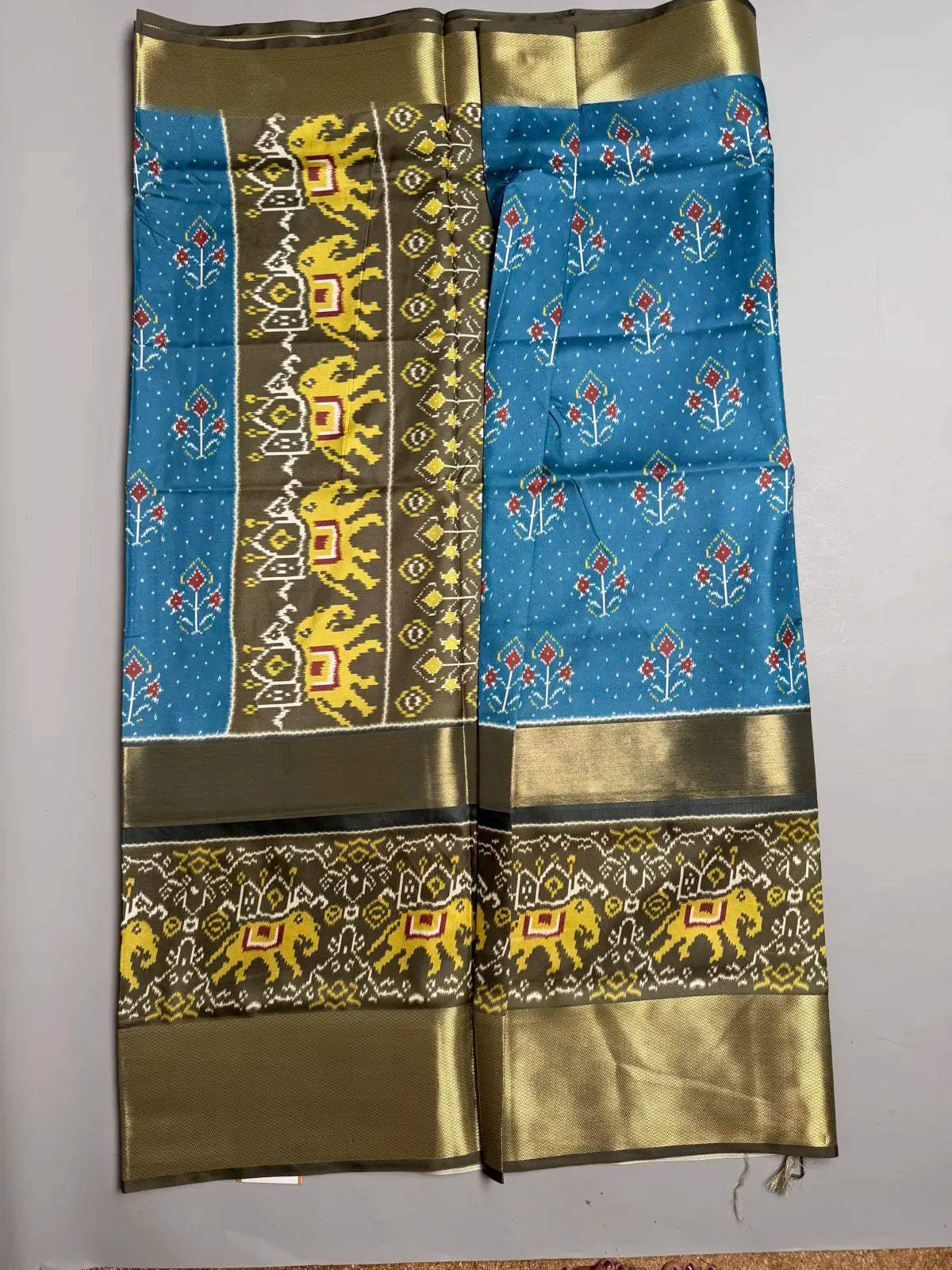 Blue Ikat Semi Silk Saree with Olive Elephant Motif Border