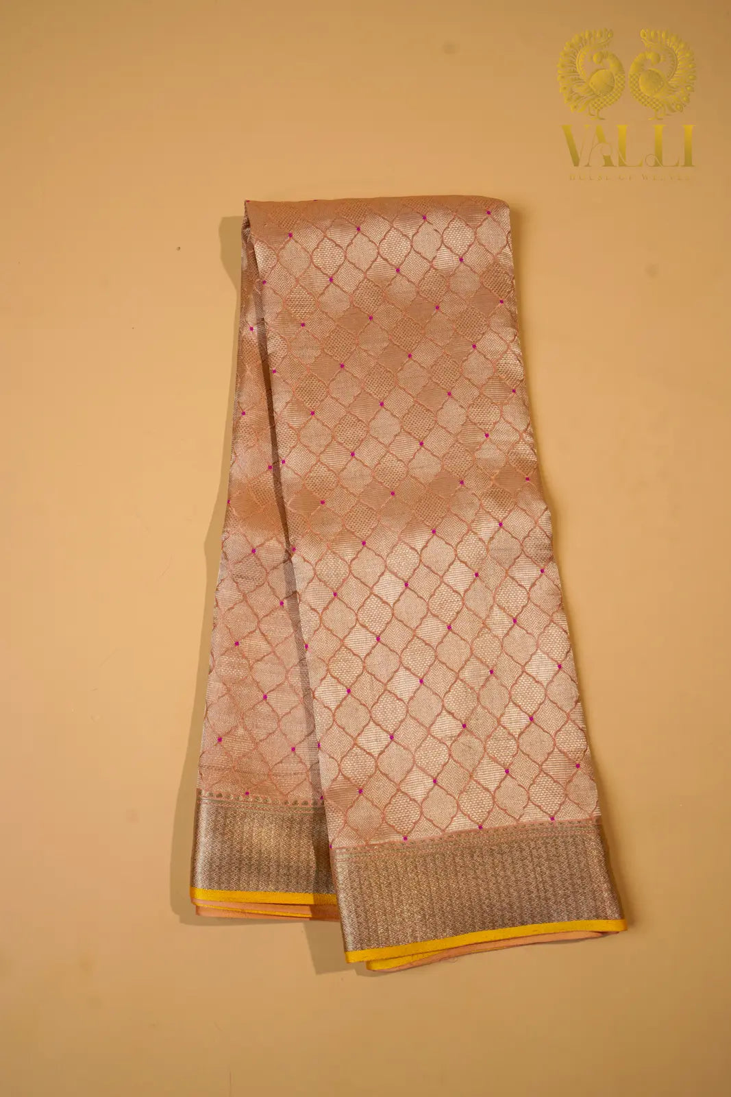 Pastel Peach Banarasi Crepe Silk Saree with Yellow Selvage‘