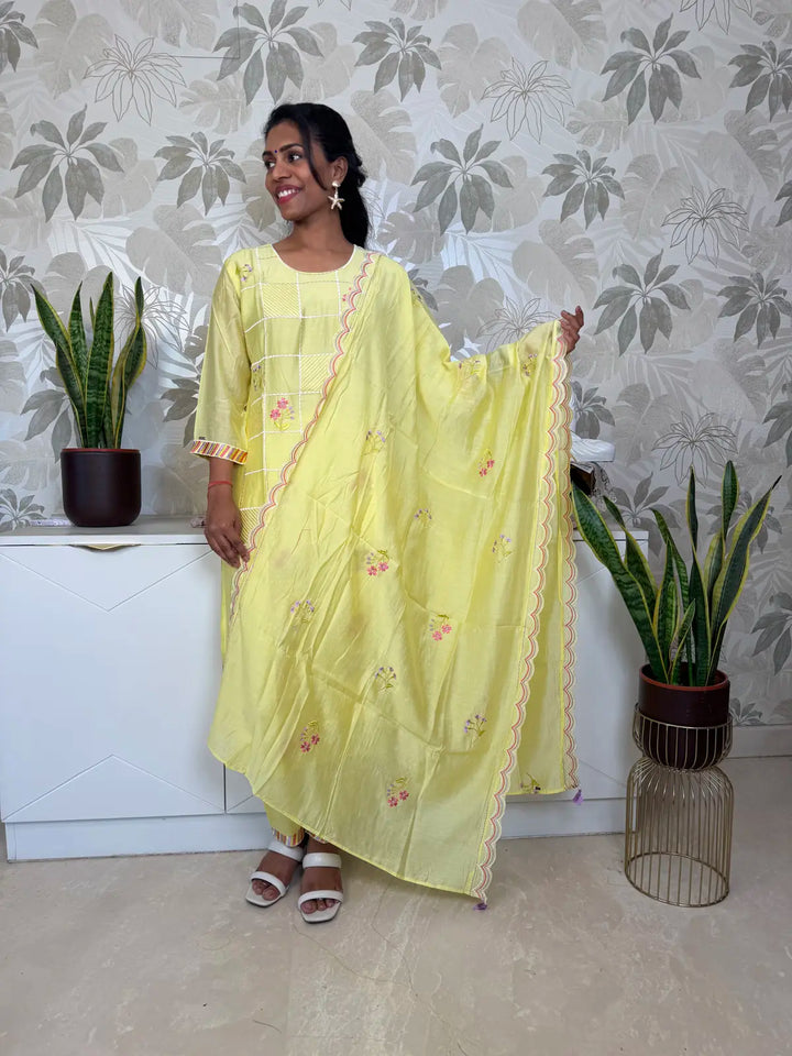 Yellow Cotton Salwar Set with Floral Embroidery and Scalloped Dupatta