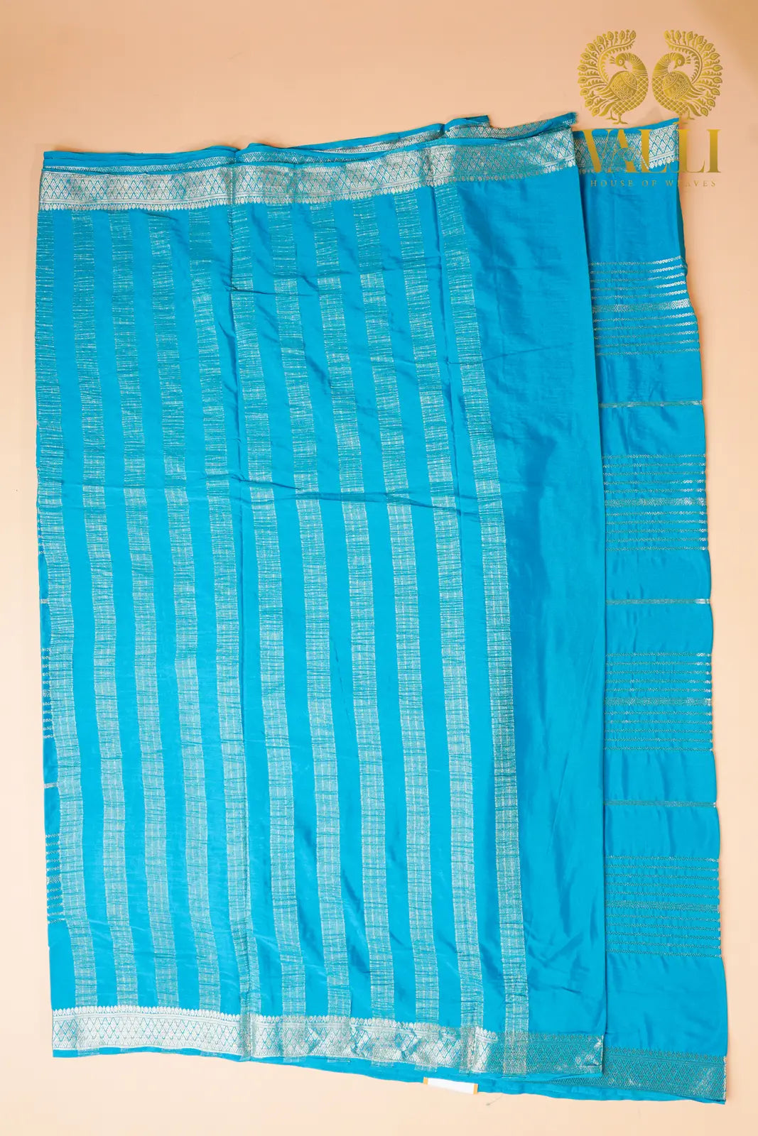 Aqua Blue Semi Crepe Silk Saree with Silver Zari Weaves