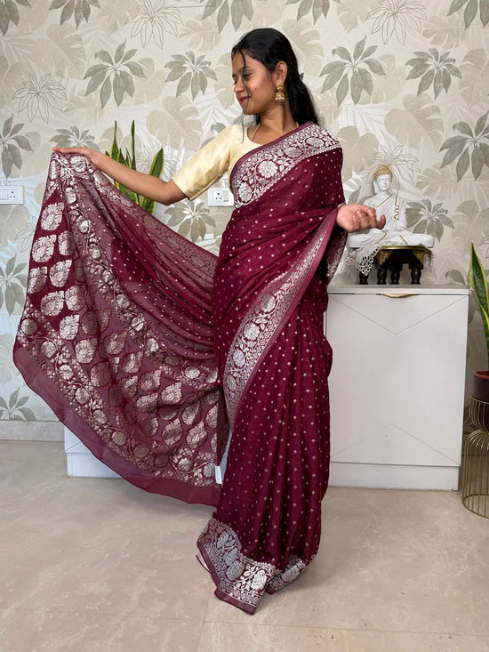 Banarasi Georgette Saree – Elegant Maroon with Silver Zari Motifs