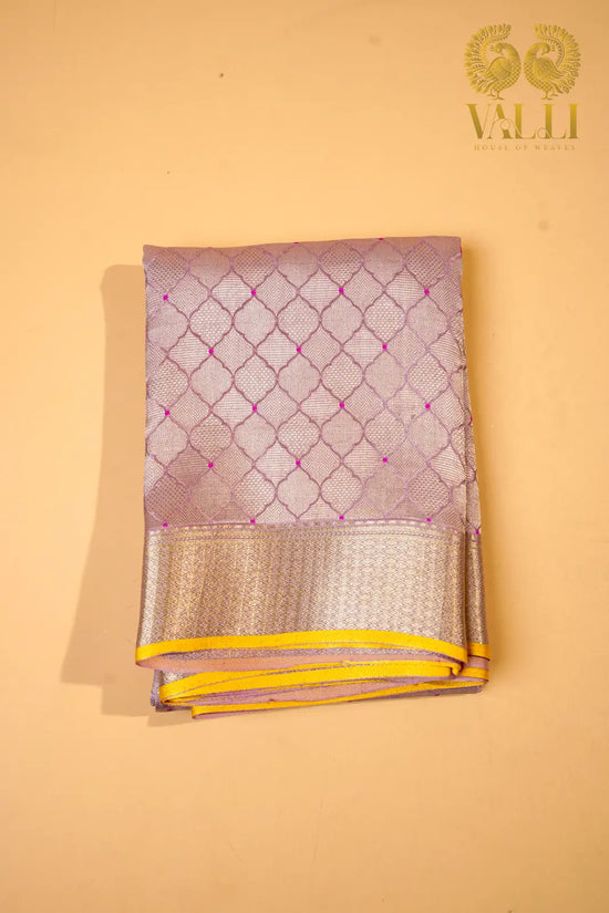 Blush Pink Banarasi Crepe Silk Saree with Yellow Selvage
