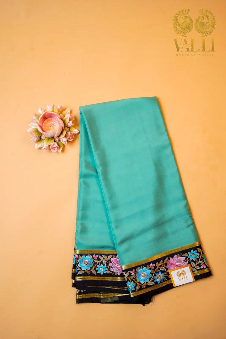 Sea Green Pure Crepe Silk Saree with Contrast Embroidered Border