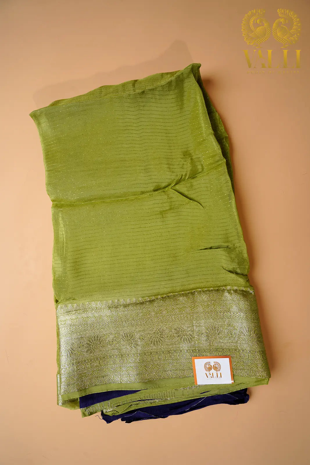 Pistachio Green Chiffon Saree with Contrast Purple Blouse