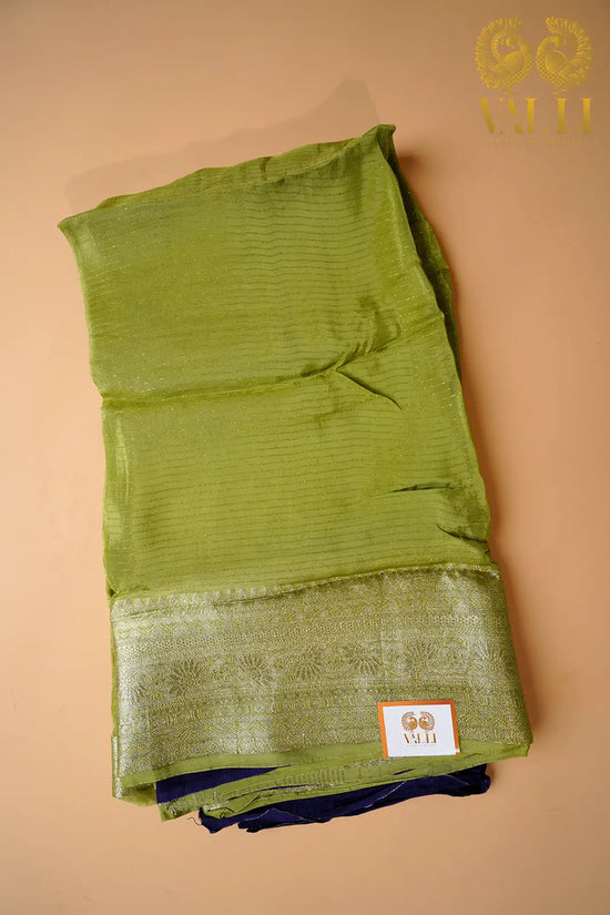 Pistachio Green Chiffon Saree with Contrast Purple Blouse